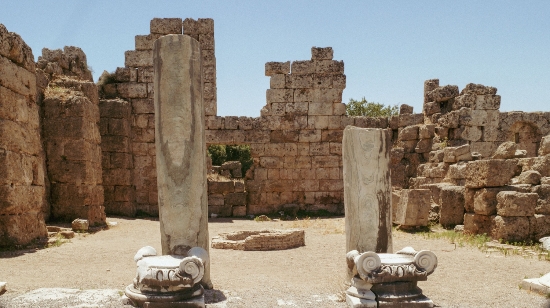 Weathered columns among ancient stone ruins