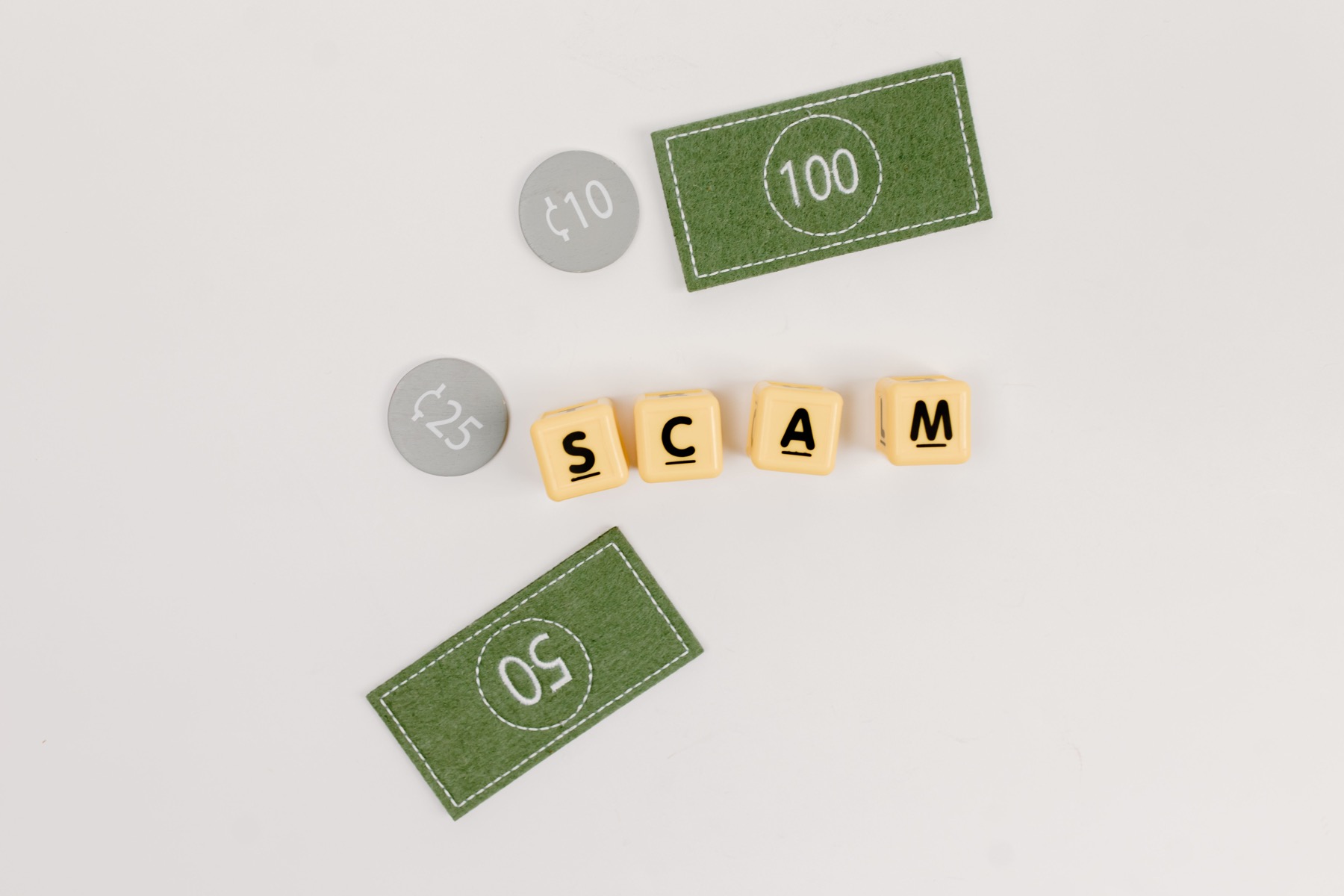 Play money and scam letters arranged to suggest financial deception